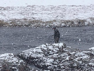 Fishing in the snow